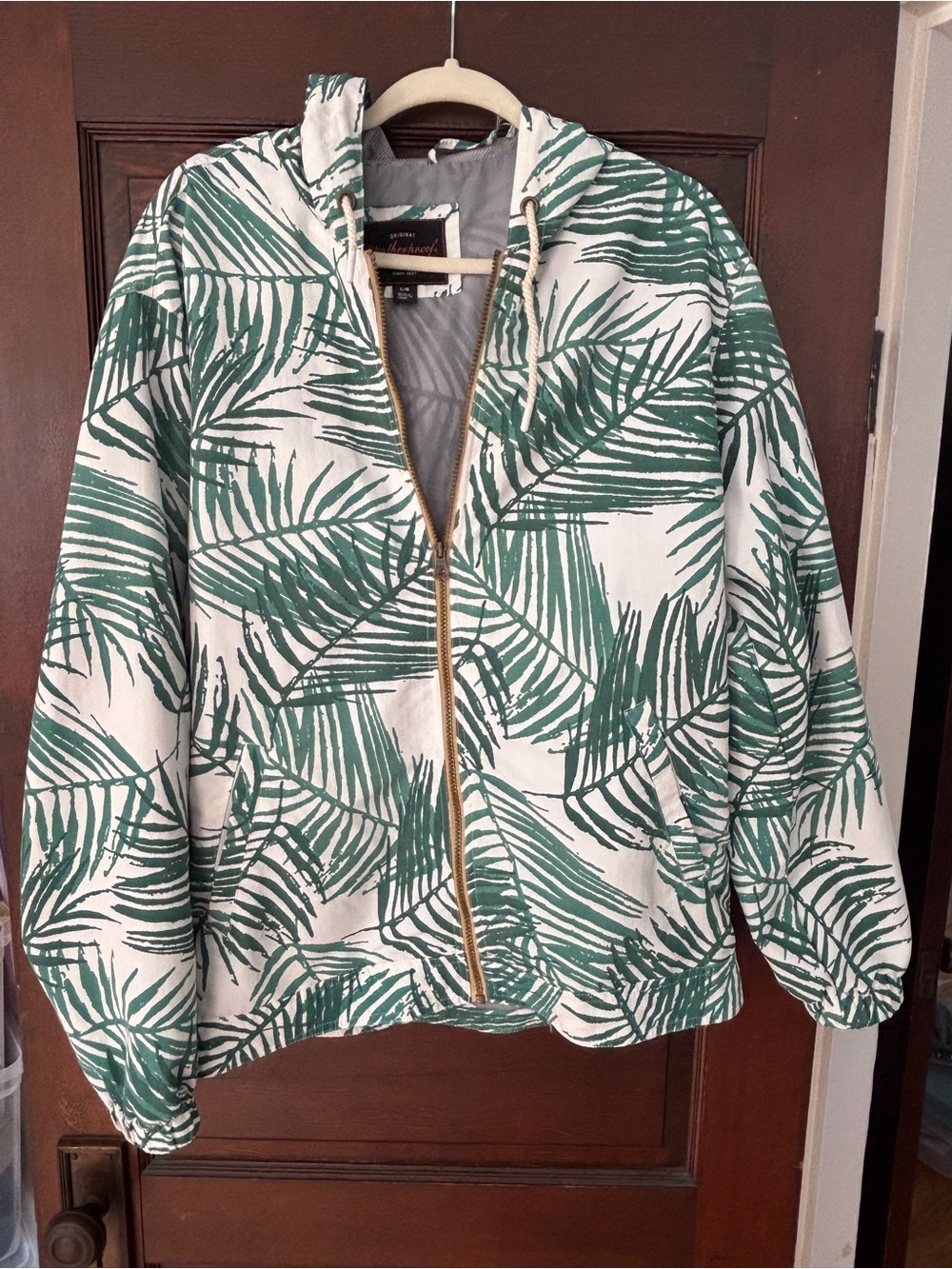 Weatherproof White Jacket with Green Palm Print and Hood